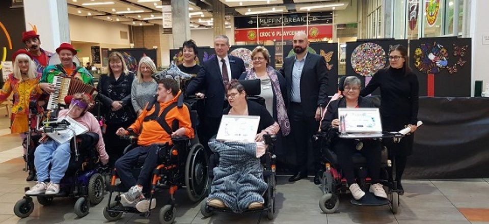 Front row, from left to right: Scope artists Barb Edis, Matt Timms, Michelle Cooling, and Sheryl McInnerney at the launch. Vicki Armstrong and Angela Cuthbert were also part of the group but were unable to be at the presentation.