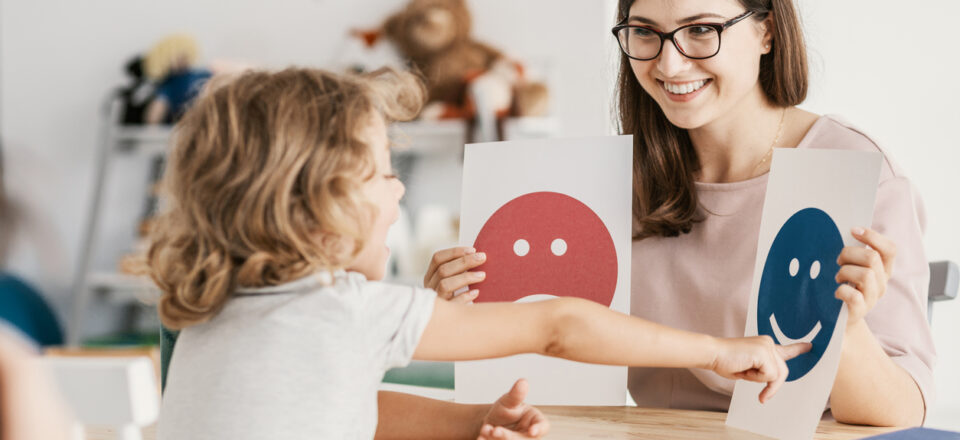Emotion emoticons used by a psychologist during a therapy session with a child with an autism spectrum disorder.