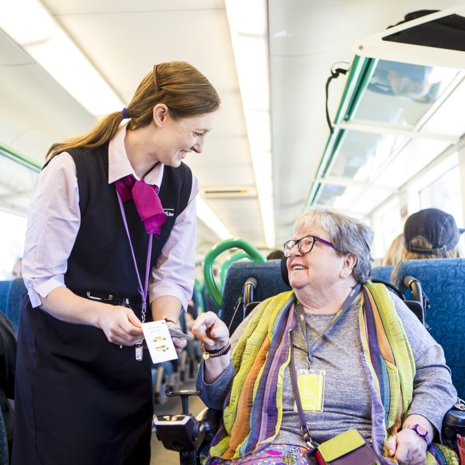 Two women, one in a wheelchair on PTV.